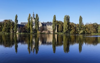 The Abbey of the Park reflecting in the pond in Leuven, Belgium, Europe