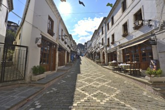 Historic city center of Gjirokastra with souvenir shops and restaurants, which has been modernises
