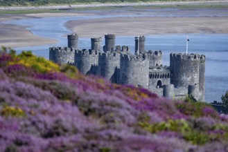 View from the mountains to Conwy Castle, ruins of the medieval castle on the river Conwy with