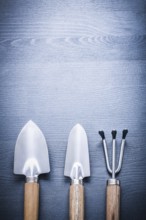 Vertical version two garden spades and fork