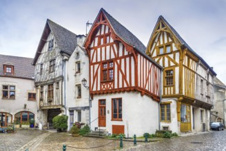 Street with historical half-timbered houses in Noyers (Noyers-sur-Serein), Yonne, France, Europe