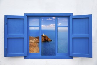 Almeria view from blue window of Cabo de Gata lighthouse photo mount