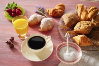 Coffe breakfast with orange juice croissant bread and strawberries