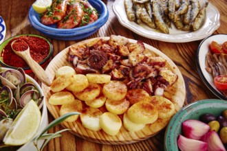 Tapas Pulpo a Feira with octopus potatoes gallega style and paprika recipe from Spain