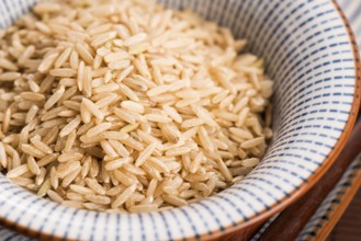 Raw brown rice in a bowl