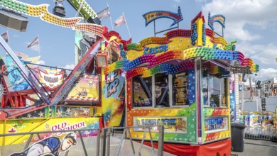 WIESBADEN, HESSE, Germany - 07-03-2023- Front of checkout cabin of a fairground ride with colourful