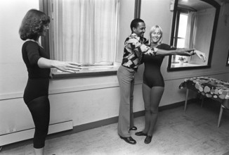 The pop group ABBA. Its two female members Anni-Frid Lyngstad and Agnetha Fältskog practice and