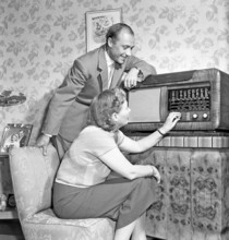Gunnar Gren and wife listening to the radio. He was one of the trio called Grenoli of AC Milan, a