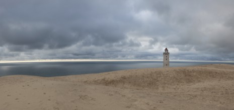 Abandoned Rubjerg Knuhe Lighthouse is located on the coast of the North Sea in Rubjerg, in the