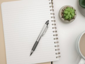 Pot with Plant and Cup Standing on Desk. Iinfrormation written on paper