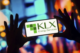 In this photo illustration, the KLX Energy Services logo is displayed on a smartphone screen