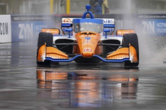 INDYCAR Series driver, SCOTT DIXON (9) of Auckland, New Zealand, travels through the turns during a