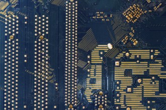 Detail of the back of a motherboard. Circuits and welds