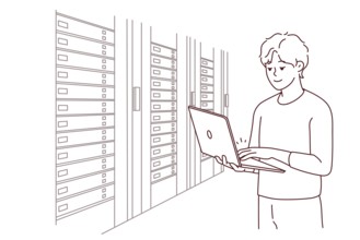 Male engineer with laptop standing near server room with computers. Man IT specialist working in