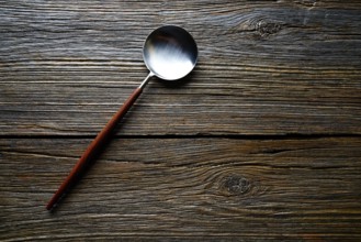 Kitchen tools spatule kitchenware on wooden background