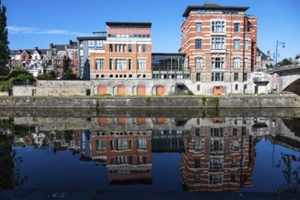 Namur, Wallon Region, Belgium, 07 28 2022, Historical buildings reflecting in the blue water of the