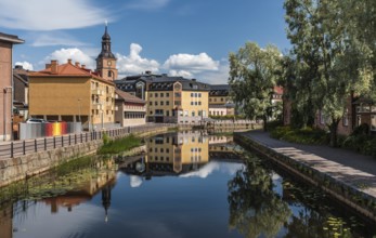 Falun, Dalarna, Sweden, 08 05 2019 Panoramic view of the city reflecting in the Nybron river,