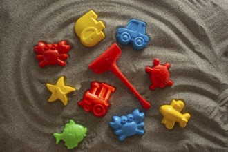 Small and colorful beach toys for children in the summer season
