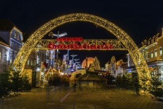 Archway, illuminated entrance to the Christmas market, night shot, main square of Leoben, Styria,