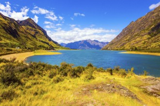 Great trip to a fabulous country. Huge Hawea Lake with turquoise smooth water. The steep slopes of