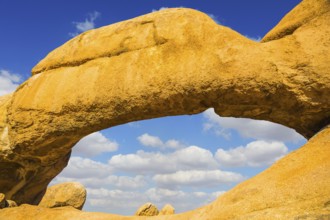 Natural group of smooth bald granites among the Namib Desert. Stone arch of Spitzkoppe, Namibia.