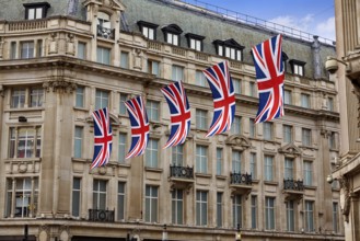 London UK flags in Oxford Street W1 Westminster England