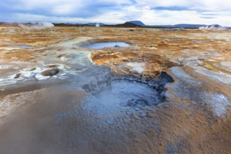 Hot Mud Pots in the Geothermal Area Hverir, Iceland. Horizontal shot