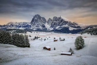 Snowy Alpe di Siusi, Seiser Alm, Sassolungo a Sassoplatto before sunrise