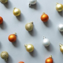 Christmas ornament. Colorful baubles on gray background. flat lay, top view