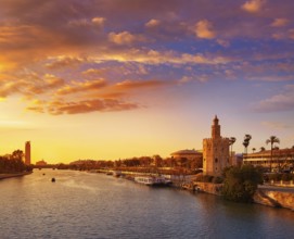 Seville sunset skyline torre del Oro in Sevilla Andalusia Spain