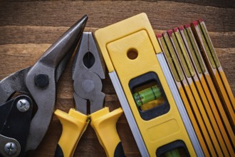 Pliers steel cutter construction level wooden meter top view image