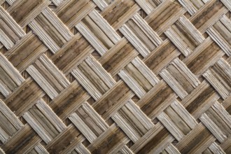 Wicker crisscross table mat horizontal image