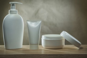 Body hygiene products two pump dispensers mockup blank white plastic bottles and facial cream in