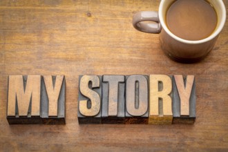 My story word abstract in vintage letterpress wood type against grunge wooden board