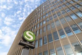 Berlin, Germany, July 28, 2019: Low angle view of Friedrichstrasse railway station sign against