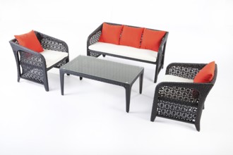 Suite of wicker furniture made of synthetic fibre on isolated background