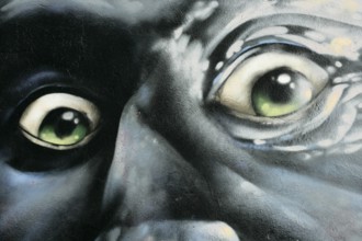 Portrait of angry man, graffiti over concrete, red, gray, green