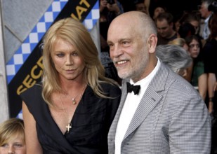 HOLLYWOOD, CA - SEPTEMBER 30, 2010: John Malkovich and Peta Wilson at the Los Angeles premiere of