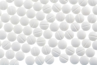 White tablets, symbolic photo for medicine, remedies and tablet addiction