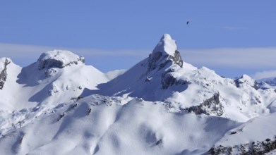 Snow covered mountains Chronenstock and Chaiserstock. View from Stoos