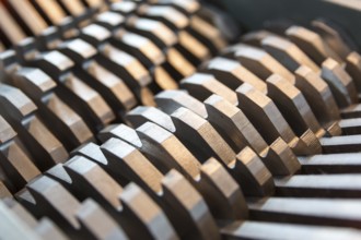 Metal blades of a chopper machine. New sharp blades made of hardened steel. Ready to cut anything.