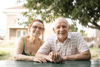 CAUCASIAN couple of silent generation in their 80s. Happy senior healthy man and woman.
