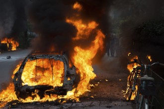 Burning car on the Elbchaussee at the G20 summit in Hamburg, 2017