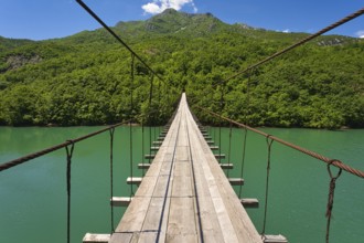 Shkopet lake with a mysterious bridge over the river leading to actually just some sheep tracks