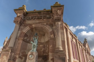 The statue of the winegrower, work of Auguste Bartholdi in front of the covered market in the city