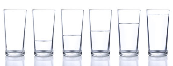 Six glasses with cold still water isolated on white background