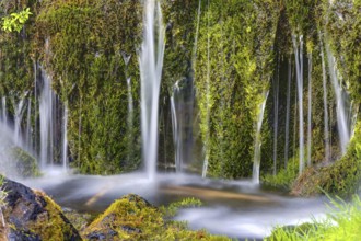 Detail of a small waterfall in the Gjain Valley in Iceland