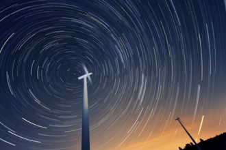 Wind turbines against the night sky
