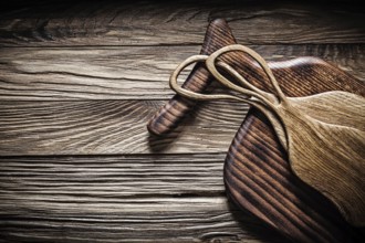 Close-up of cutting and serving boards on old wood