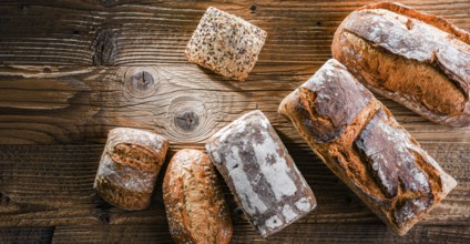 Composition with assorted bakery products on wooden table